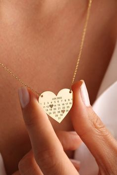 Personalised Heart Calendar Necklace, Personalized Date Necklace , Custom Birthday Necklace, Date Necklace , Year Jewelry, Mother's Day Gift S H O W ∙ Y O U R ∙ S T Y L E UNIQUE ♥  Heart Calendar necklace in 18K Gold plated, Sterling Silver plated or Rose gold plated PERFECT GIFT ♥ Make your friends or family happy with this exclusive gift. MINIMALIST DESIGN ♥ Wear this jewellery with joy and show your style with the wonderful designs. SATISFACTION GUARANTEE ♥ Your satisfaction is always our pri Heart Cut Necklace For Valentine's Day Birthday, Engraved Heart Pendant Necklace For Birthday Gift, Birthday Heart Necklace With Hallmark, Heart Necklace With Hallmark For Birthday, Heart Shaped Necklace With Hallmark For Birthday, Gold Heart Beads Jewelry For Birthday, Valentine's Day Birthstone Heart Necklace For Birthday, Valentine's Day Gold Heart Necklace With Birthstone For Birthday, Heart Pendant Jewelry For Valentine's Day Birthday