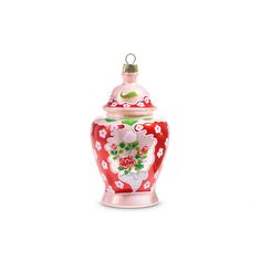 an ornament shaped like a vase with flowers and hearts on the lid is shown