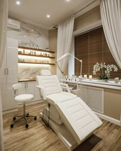 a white chair sitting next to a counter in a room