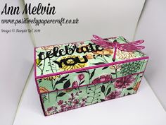 an open box with flowers on it