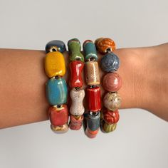 🌟 Handcrafted Design: Each bracelet is carefully made with premium ceramic beads in a range of vibrant colors. 🌟 Adjustable Fit: Features a durable cord with adjustable sizing for comfort and easy wear. 🎁 Gift-Ready: Ideal for birthdays, anniversaries, or simply to say "thinking of you." 🌞 Versatile Style: Lightweight and comfortable, suitable for all-day wear. Bracelet length can be selected from the variations tab. Colors and tones may vary slightly depending on your screen's brightness and display settings. 📨 Feel free to message us with any questions. We're here to help! 🛫  Processing & Shipping: Processing: 1-2 business days.  Shipping: 6-8 business days for the US, CA, and EU. (Express shipping option is available.) ⤵️ Explore More: Discover our curated collection! https://www. Ceramic Beads Bracelet, Ceramic Bracelet, Stretchy Beaded Bracelet, Beads Bracelet Design, Colorful Ceramics, Jewelry Workshop, Ceramic Jewelry, Ceramic Beads, Jewelry Unique