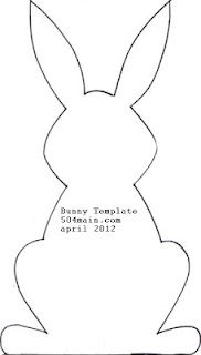 an easter bunny cut out from paper