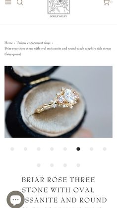 an advertisement for a jewelry store featuring two engagement rings in their presentation box, with the text bridal rose three stone with oval sesame and round