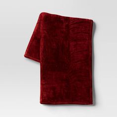 a red towel hanging on the wall