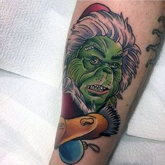 an old man with a grin face on his arm