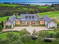 an aerial view of a large home in the country