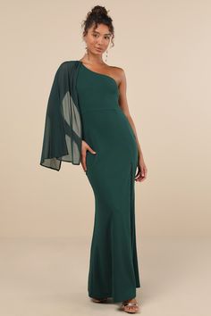 Majestic Attitude Emerald Cape Sleeve One-Shoulder Maxi Dress Drape Shoulder Dress, Wide Shoulders Dresses, Prom Dress Shops, Green Formal Dresses, Dress Shops, Military Ball Dresses, Black Cape, Long Sleeve Dress Formal, Maxi Dress Prom