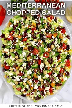 this mediterranean chopped salad is loaded with fresh vegetables, feta cheese and olives