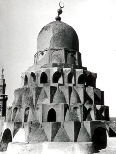 an old black and white photo of a building with a dome on it's roof