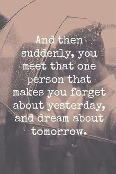 two people kissing under an umbrella with the words, and then suddenly you meet that one person that makes you forget about yesterday and dream about tomorrow