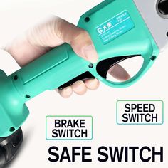 a hand holding a green electric device with the words brake switch and safe switch on it