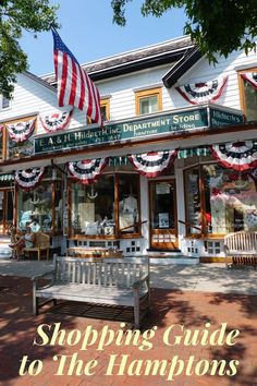 a storefront with an american flag hanging from it's roof and the words, shopping guide to the hamptons