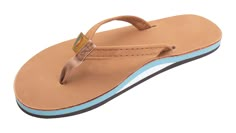 PRICES MAY VARY. Single Layer Arch Premier Nubuck Leather 1/2" Narrow Strap Double Stitched Nylon Toe Piece If any sandal says Rainbow, this is it! This single layer premier leather sandal is offered with a narrow strap for a feminine touch. The single layer premier leather sandal is made of top grade nubuck leather; the top sole is embossed with the Rainbow logo. This model comes with a narrow strap, also nubuck leather; it is double stitched, and the nylon toe piece is secured with a box X stitch, all using bonded nylon thread. The single layer midsole and arch support is triple glued for maximum durability to our non-slip Rainbow bottom. We finish it off with the Original Rainbow woven label on the right strap, the mark of a genuine Rainbow Sandal. Rainbow Flip Flops, Rainbow Logo, Rainbow Sandals, Leather Dye, Leather Flip Flops, Leather Sandals Women, Kids Luggage, Woven Labels, Woven Label