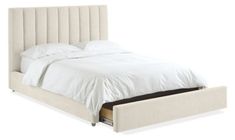 a bed with a white headboard and pillows on it's sides, in front of a white background