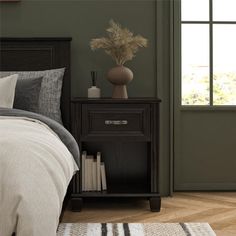 a bedroom scene with focus on the bed and nightstand