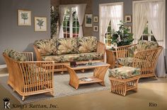 a living room filled with lots of furniture and decor on top of a carpeted floor