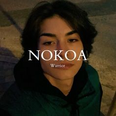 a woman wearing a green hoodie with the words nokoa warrior over her face