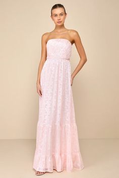 You'll be a vision of perfection in a look like the Lulus Adorably Elegant Blush Pink Jacquard Floral Strapless Maxi Dress! Lightweight woven fabric, with a shiny, burnout floral jacquard pattern throughout, shapes a strapless bodice with a diagonally pleated texture, hidden no-slip strips, and side boning. Fitted waist tops a flaring skirt that falls to a tiered maxi hem. Hidden zipper/clasp at back. Light Pink Winter Formal Dresses, Pale Pink Bridesmaid Dress, Light Pink Floral Bridesmaid Dresses, Pink Bachelorette Dress, Mixed Pink Bridesmaid Dresses, Light Pink Dress Long, Pink Floral Bridesmaid Dresses, Baby Pink Bridesmaid Dresses, Pink Pattern Dress