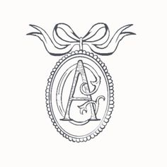 the initial monogram with a bow on it