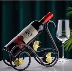 a wine bottle holder that is shaped like a bike