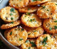 small crackers with herbs and seasoning in a bowl