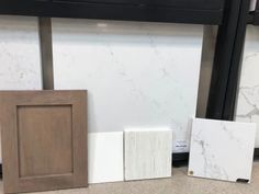 marble tiles and wooden frames on the floor