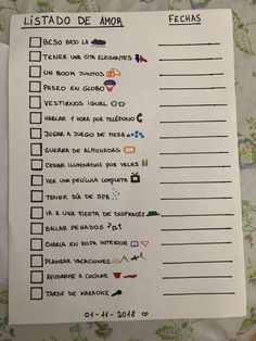 a list that has been placed on top of a sheet of paper with spanish words