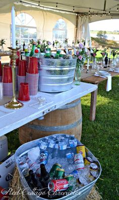 an outdoor party with beer and wine bottles