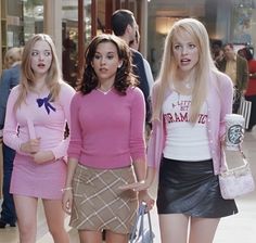 the mean girls are walking down the street