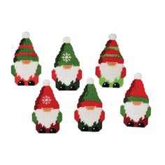 six christmas gnomes with hats and scarves are shown in the shape of snowflakes