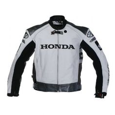 a white and black motorcycle jacket with the words honda on it's back side