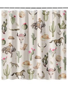 the shower curtain is decorated with cactus and wild animals