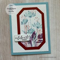 a close up of a card with flowers on it