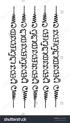 an old english alphabet with cursive writing in black and white on a dark background