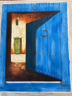 a painting of an open blue door with a wreath on it