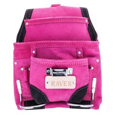 the back pocket of a pink purse with black trimmings and two pockets on each side