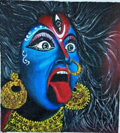 a painting of a woman's face painted in blue and red with gold accents