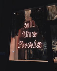 a neon sign that reads all the feels