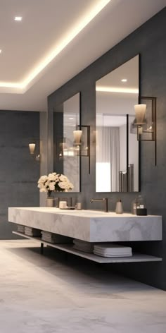 a modern bathroom with two sinks and mirrors