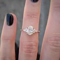 a woman's engagement ring on her finger