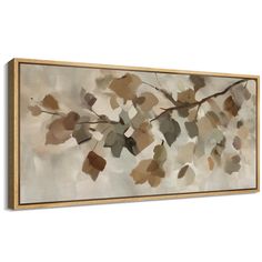 a painting with leaves hanging on the wall