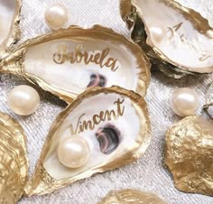 three oysters with pearls and the word bride written on them