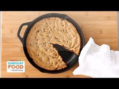 an oreo cookie in a skillet on a cutting board