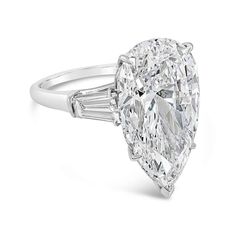 an oval and baguette cut diamond ring