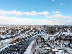 an aerial view of a parking lot in the winter