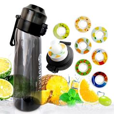 the blender is surrounded by fruit and other items for making smoothies or juices