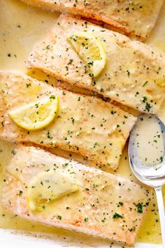 baked salmon with lemon and parsley in a casserole dish, ready to be eaten