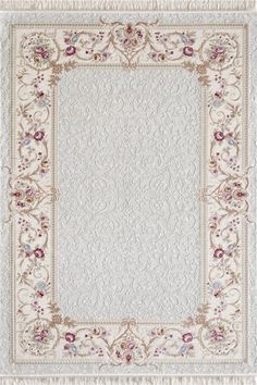 a white rug with pink flowers on it