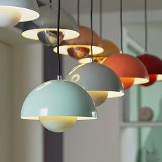 several different colored lights hanging from the ceiling