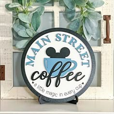 there is a sign that says main street coffee